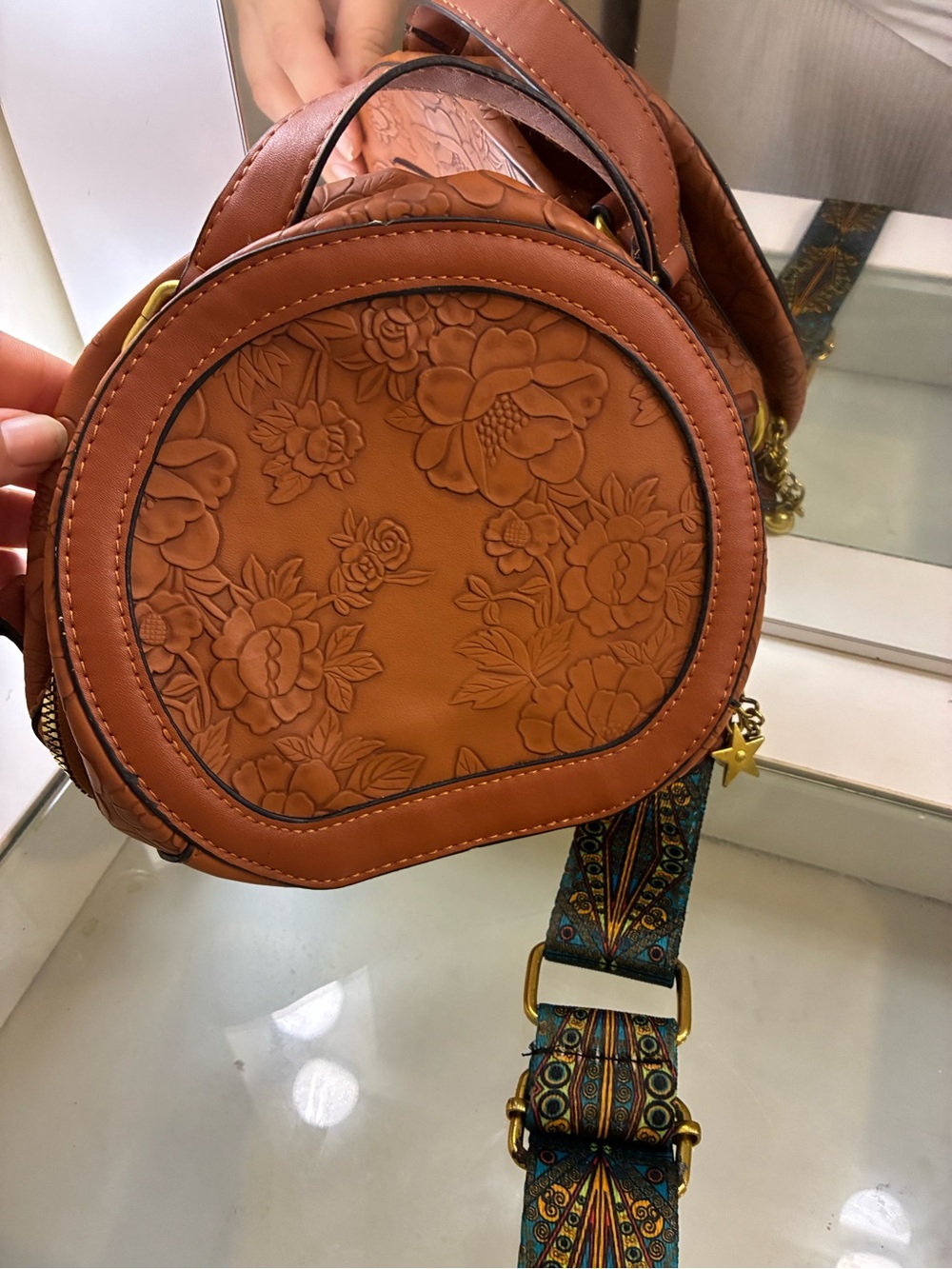 Women’s Brown Round Floral Embossed Crossbody Bag Zip, Patterned Blue Strap